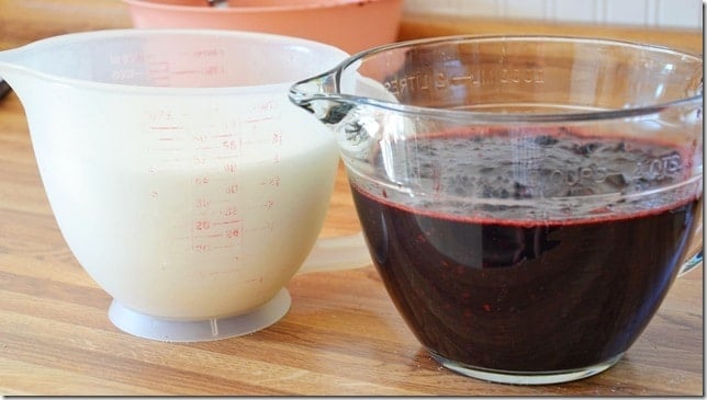 equal parts of mashed blackberries and sugar measured out and sitting side by side