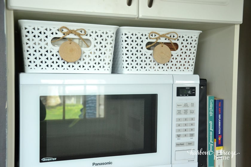 microwave area of a pantry cupboard organization system