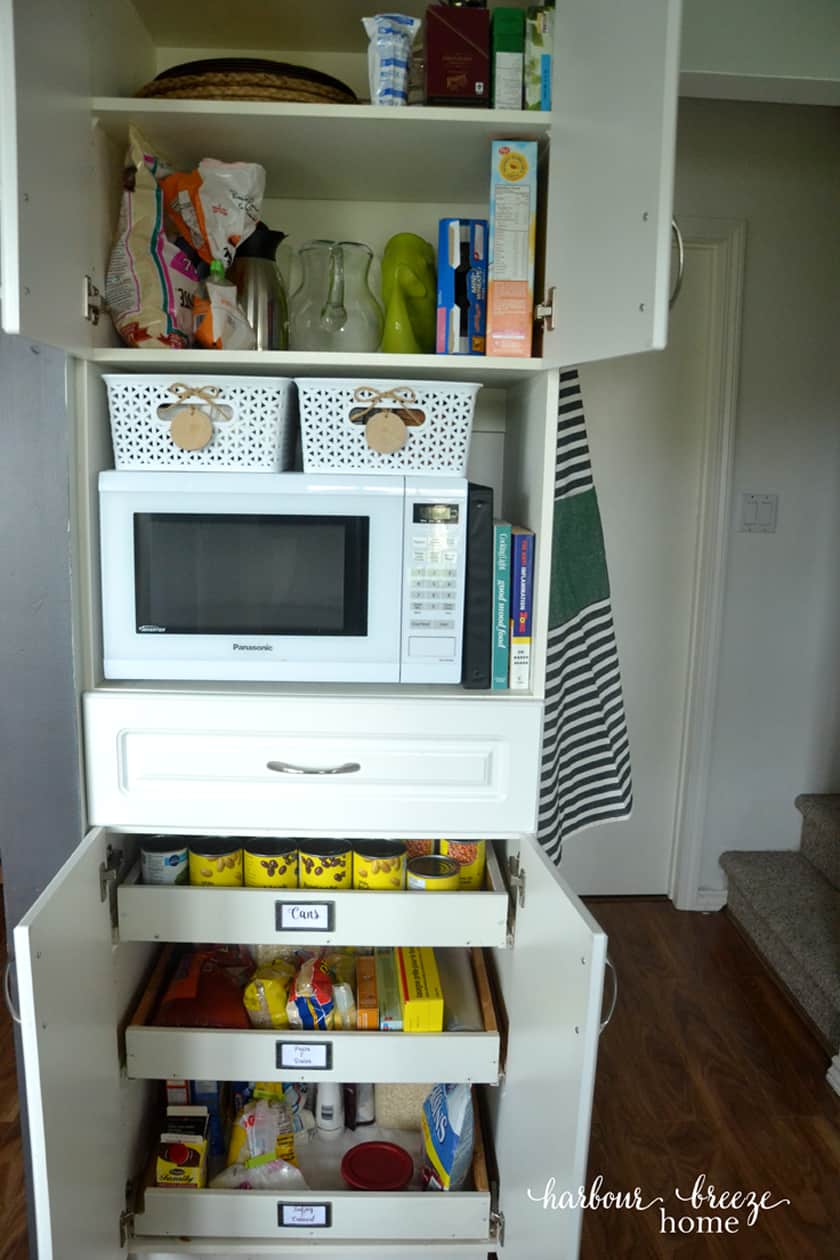 cupboard pantry organization after it was organized