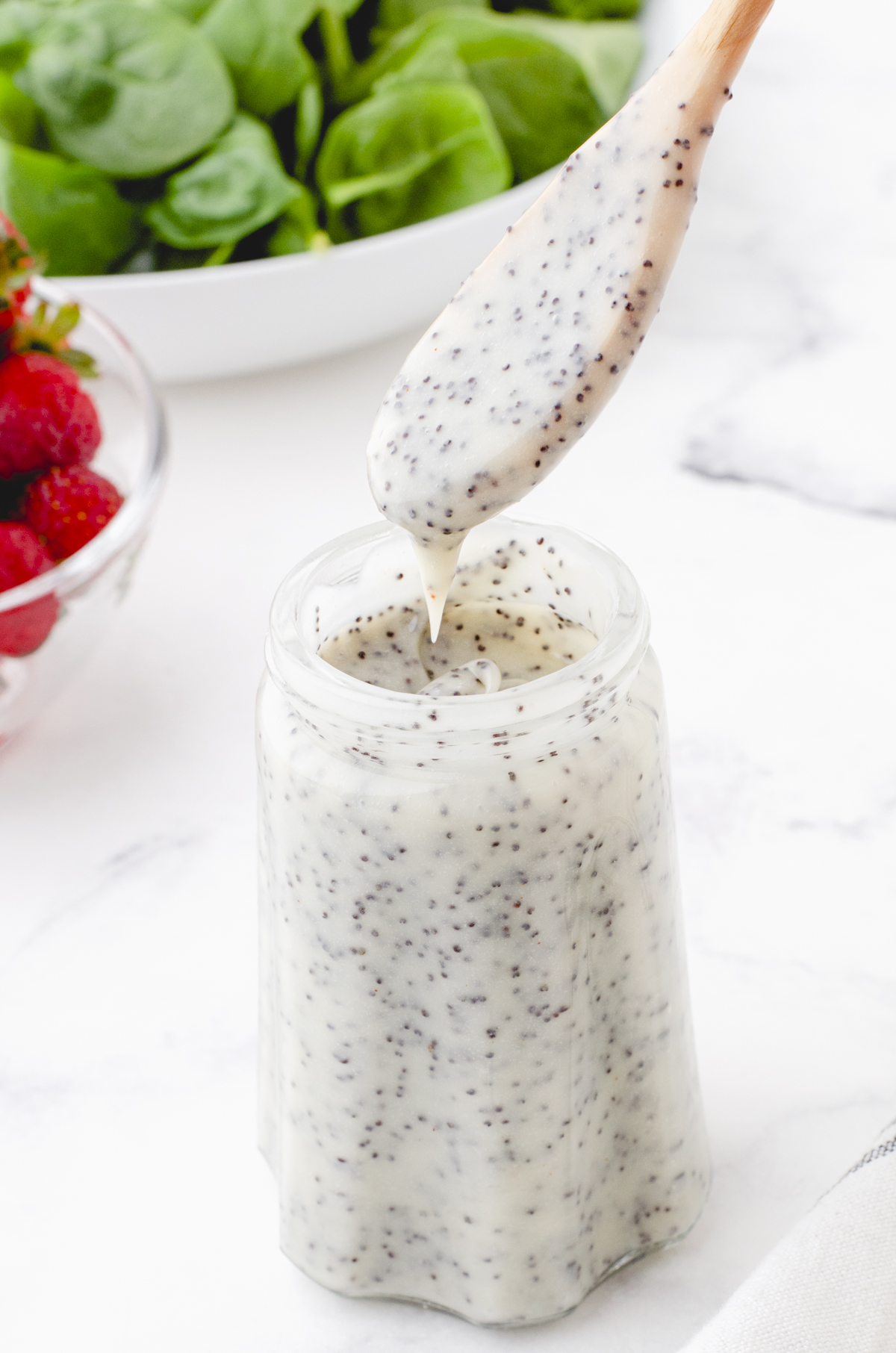 A jar of homemade poppy seed dressing