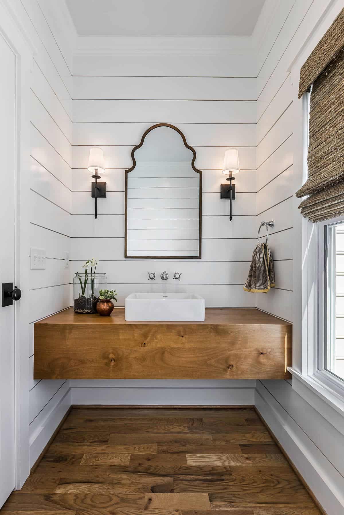 Image for Simple and elegant farmhouse style powder room makes smart use of space