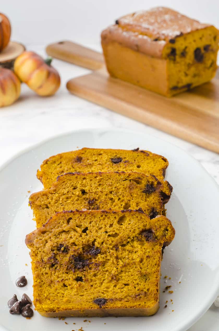 Sliced chocolate chip pumpkin bread on a platter