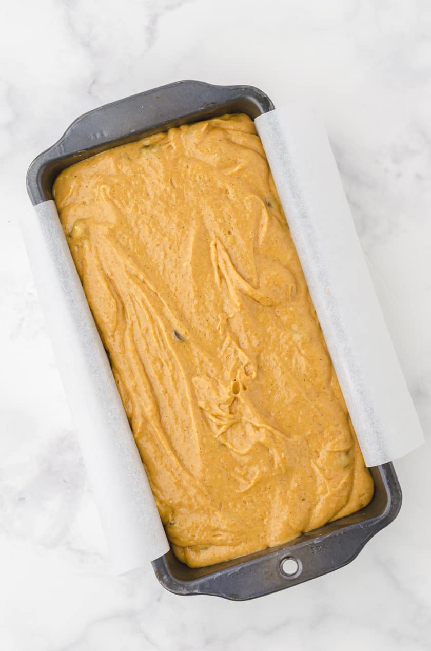 Pumpkin bread batter in a loaf pan