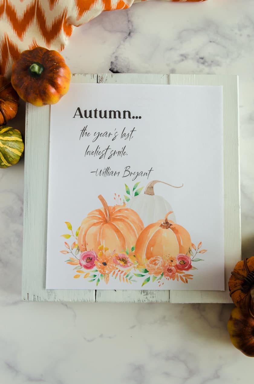 Fall art printable with watercolor pumpkins and the saying "Autumn...the year's best lovelist smile"