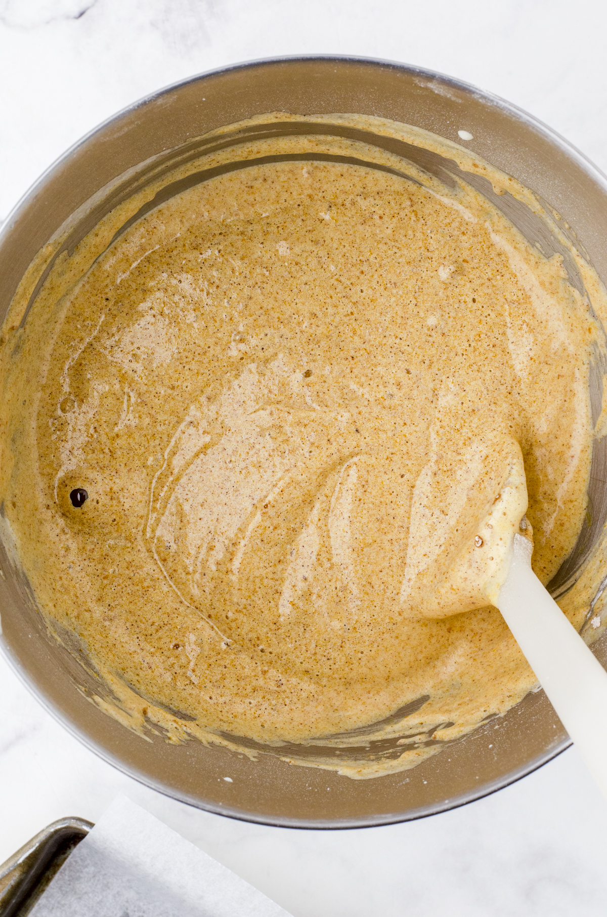 Pumpkin cake batter after it is all mixed together.