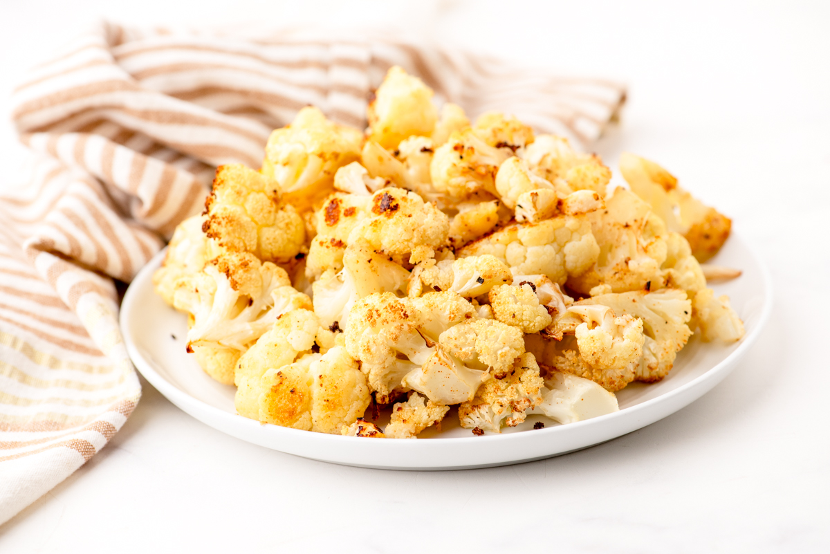 Roasted cauliflower on a serving platter.