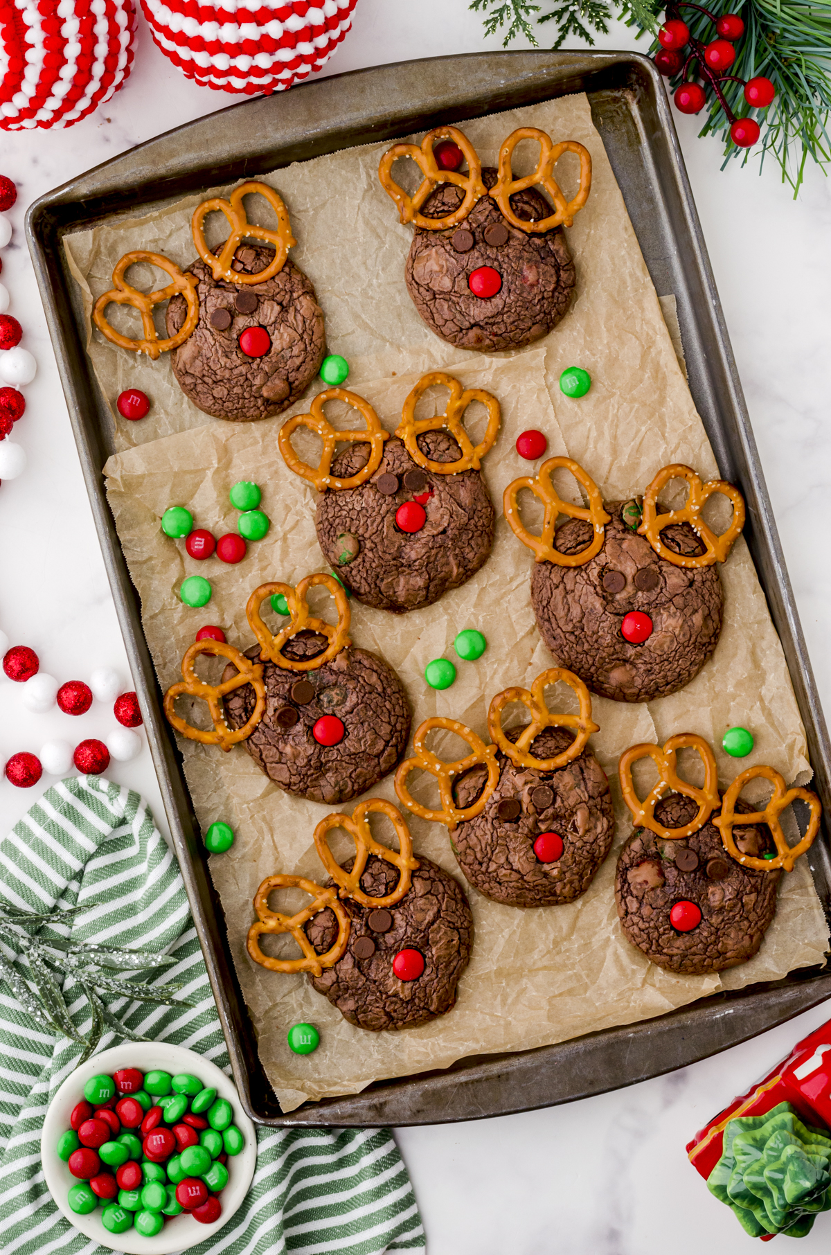 A christmas cookie tray filled with rudolph cookies