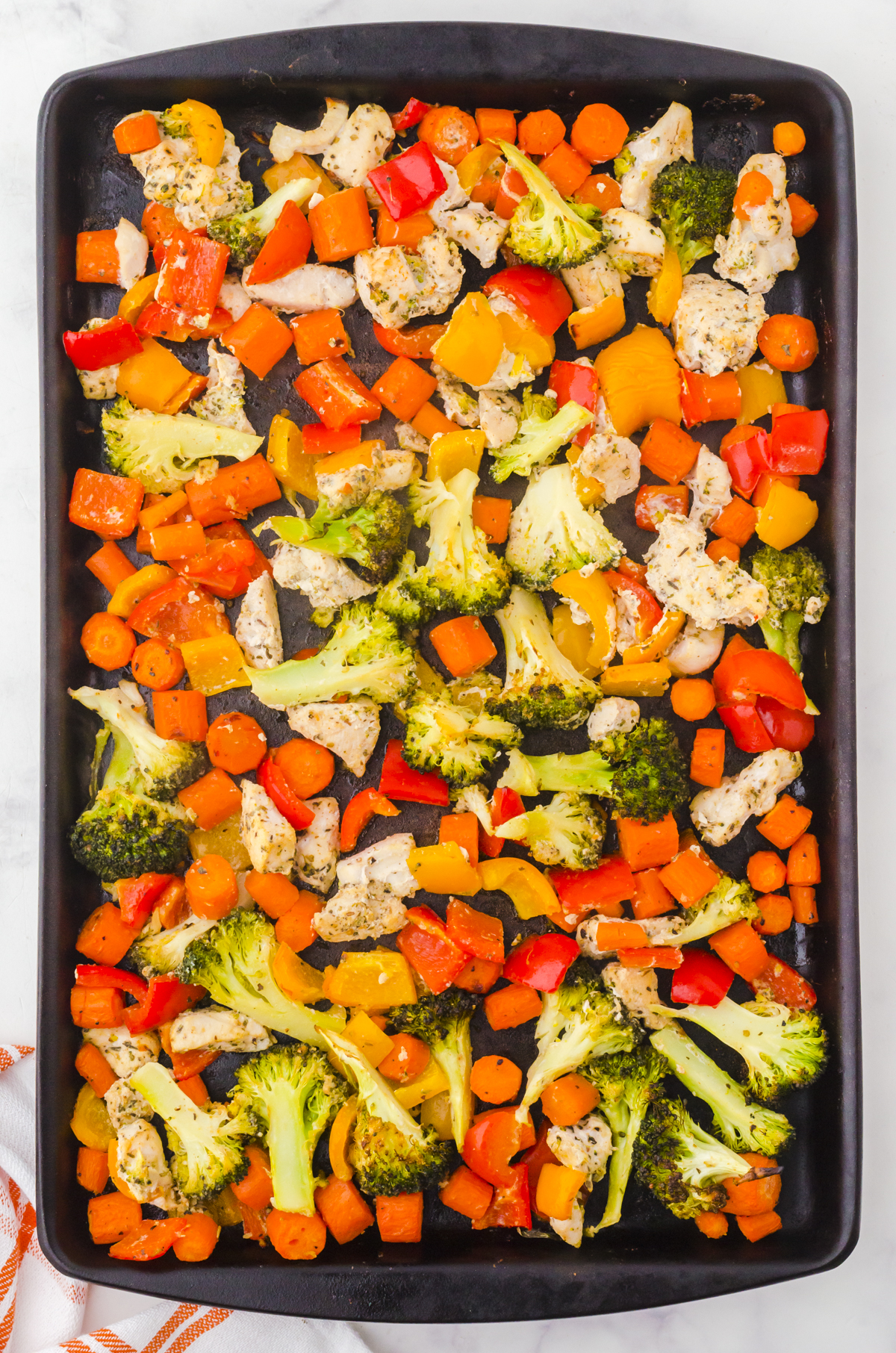 Finished sheet pan and veggies dinner