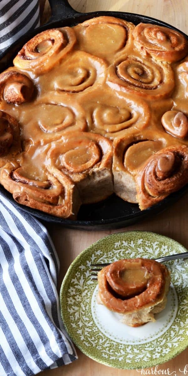 caramel cinnamon rolls in a cast iron skillet