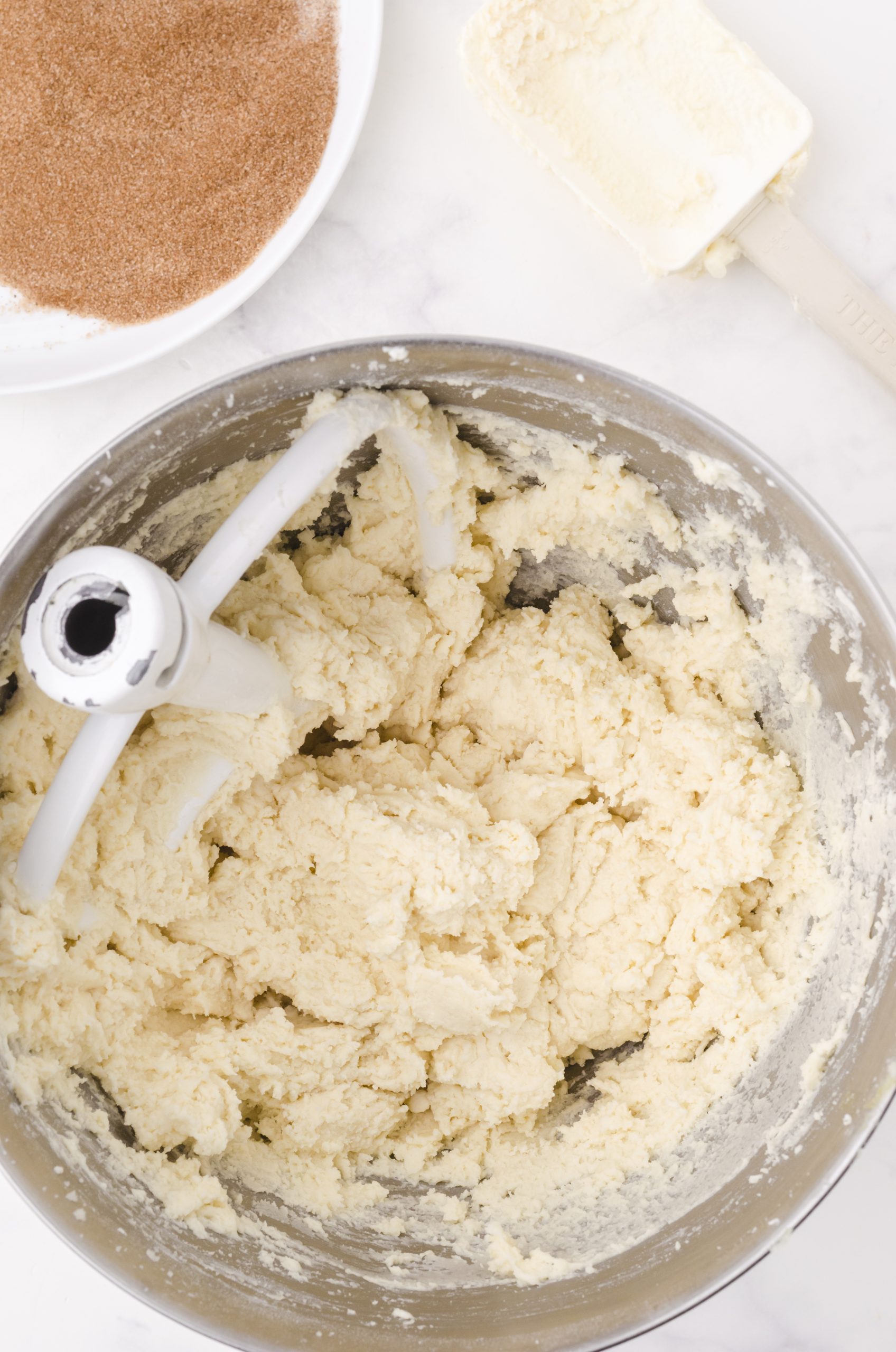 Snickerdoodle cookie dough in a bowl.