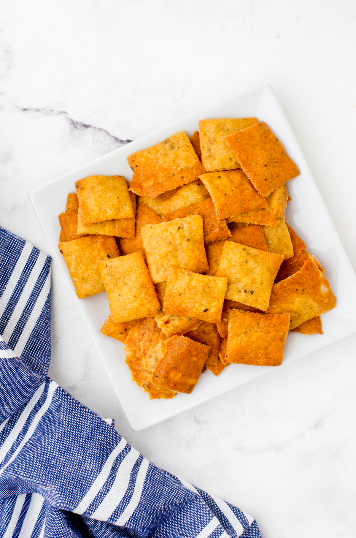 Sourdough chips on a plate.