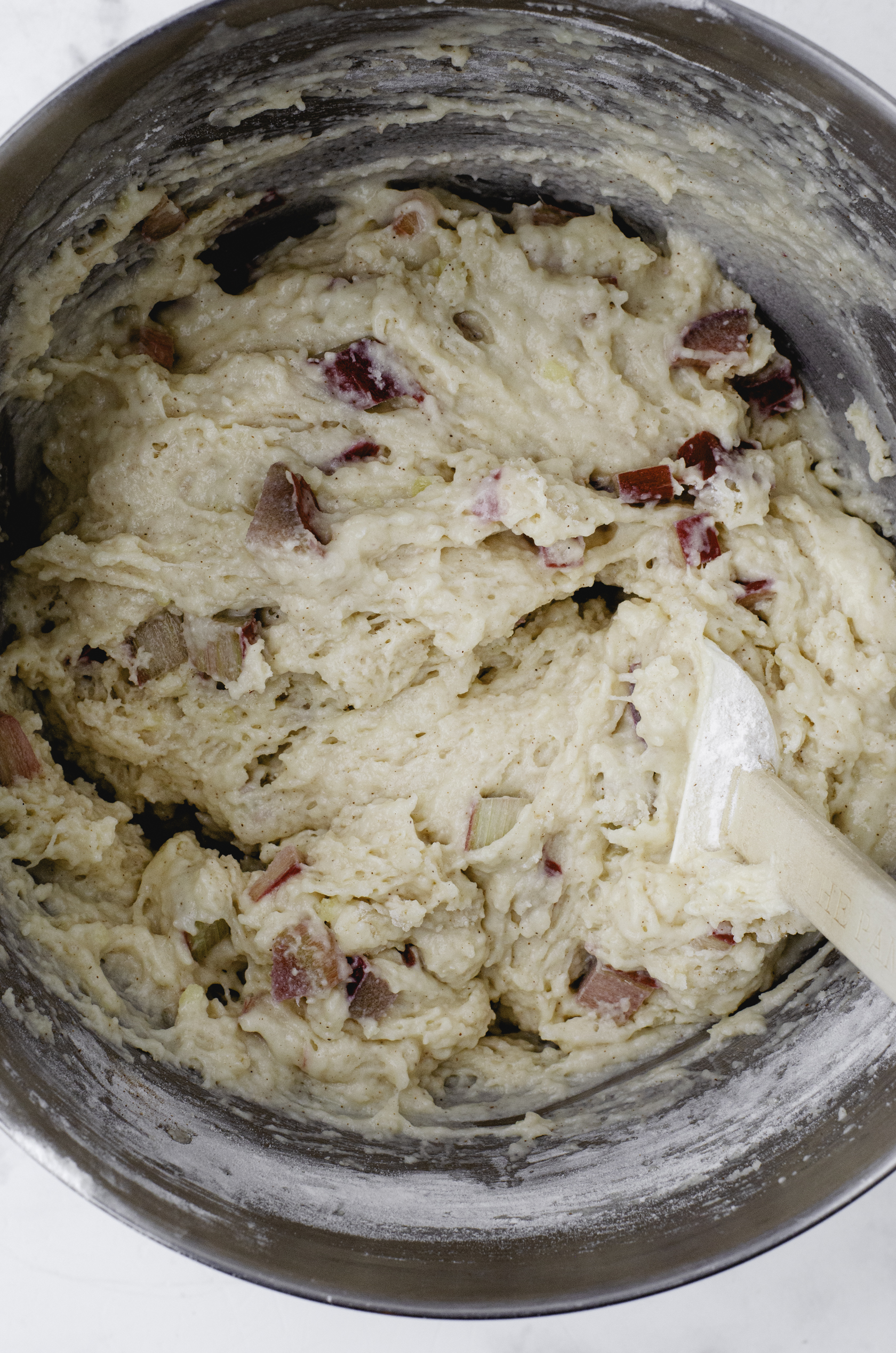 Rhubarb sourough muffin batter in a bowl