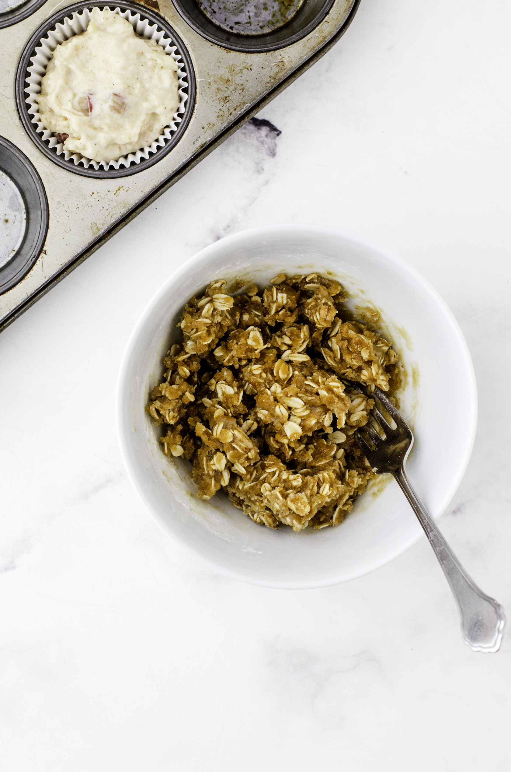 Rhubarb muffin topping mixed in a medium sized bowl.