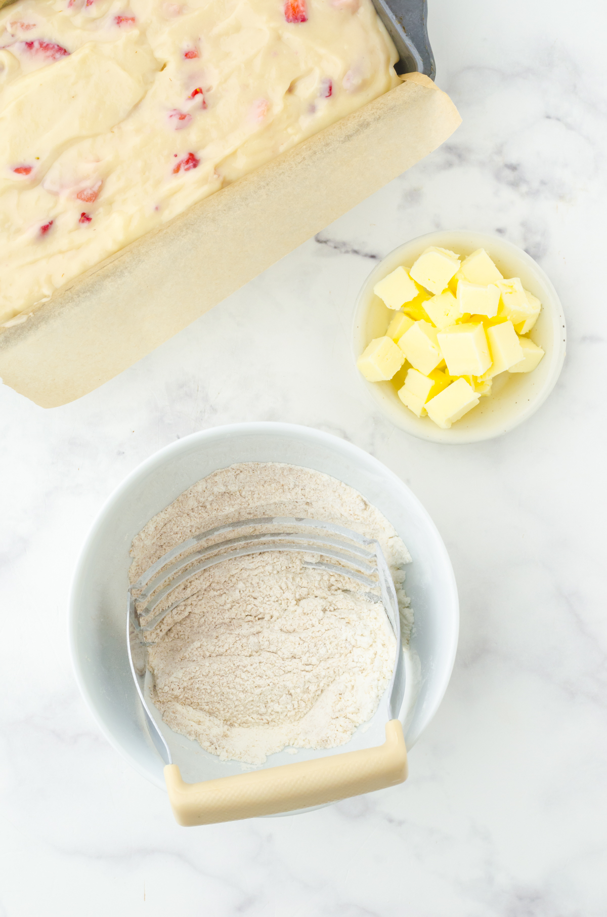 Dry ingredients for crumble topping in small bowl.