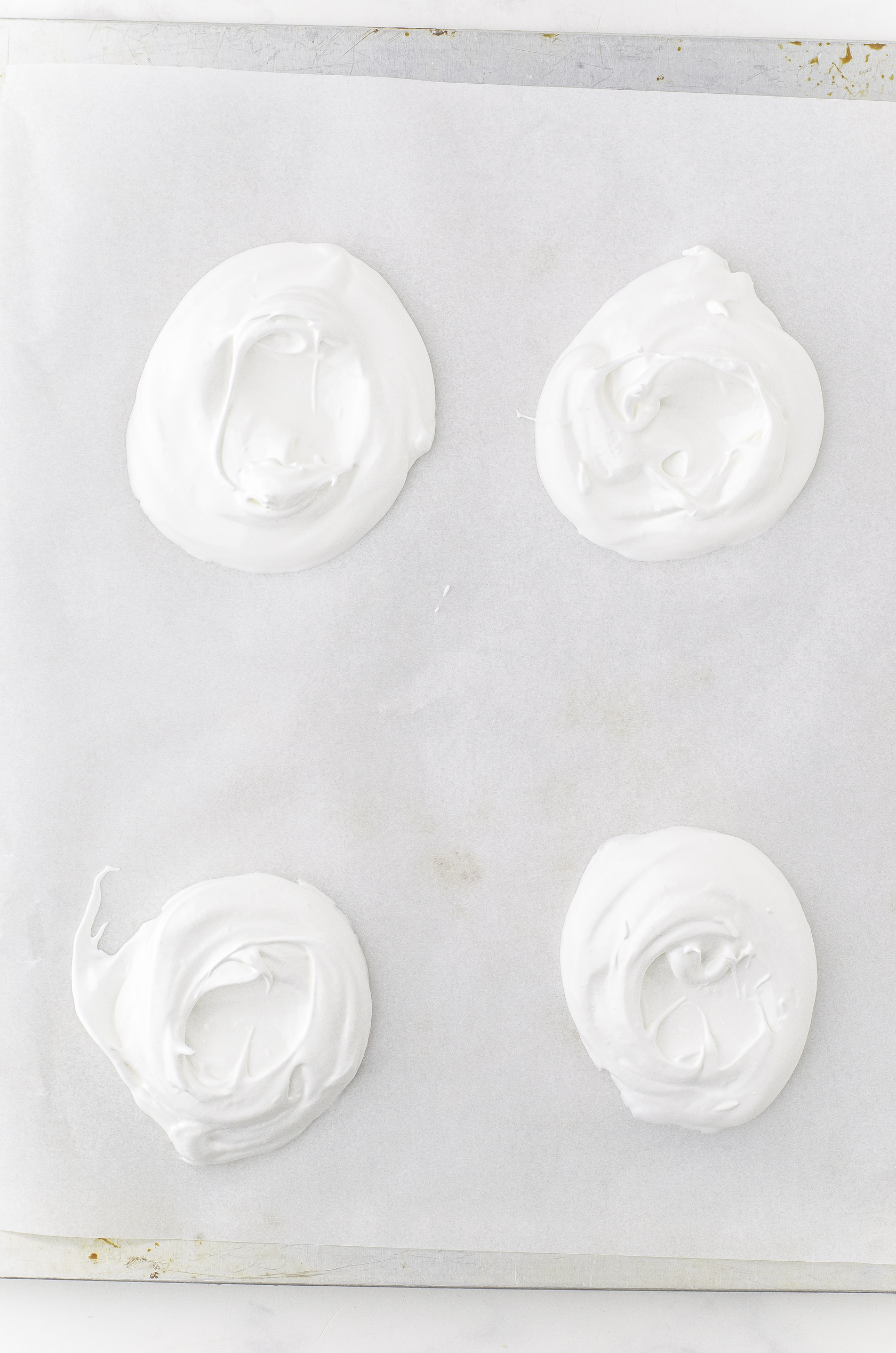 Individual pavlovas ready to be put in the oven.