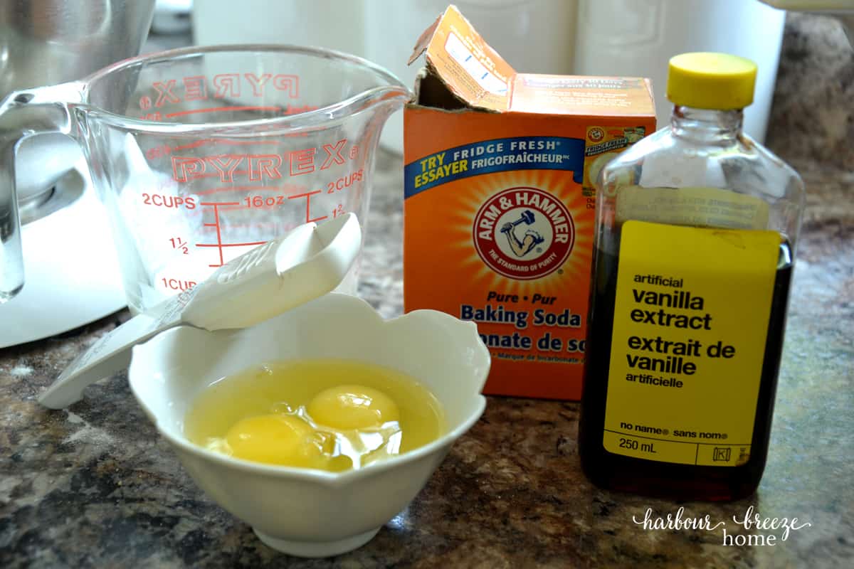 ingredients that will be added to flour and chocolate mixture for the texas sheet cake