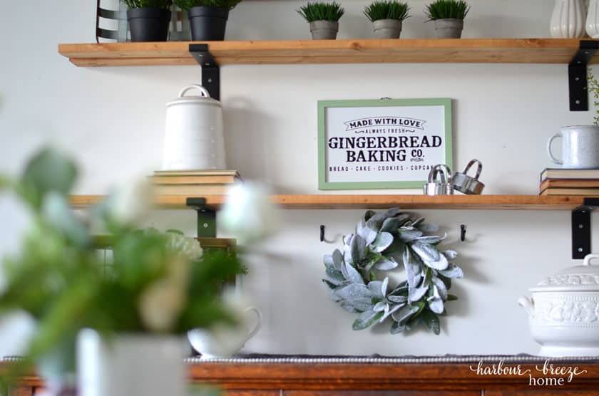 Look for items tagged as "Christmas decor" that could be used for Winter decor as well - like a snow frosted faux wreath and a Gingerbread Baking Co. sign.