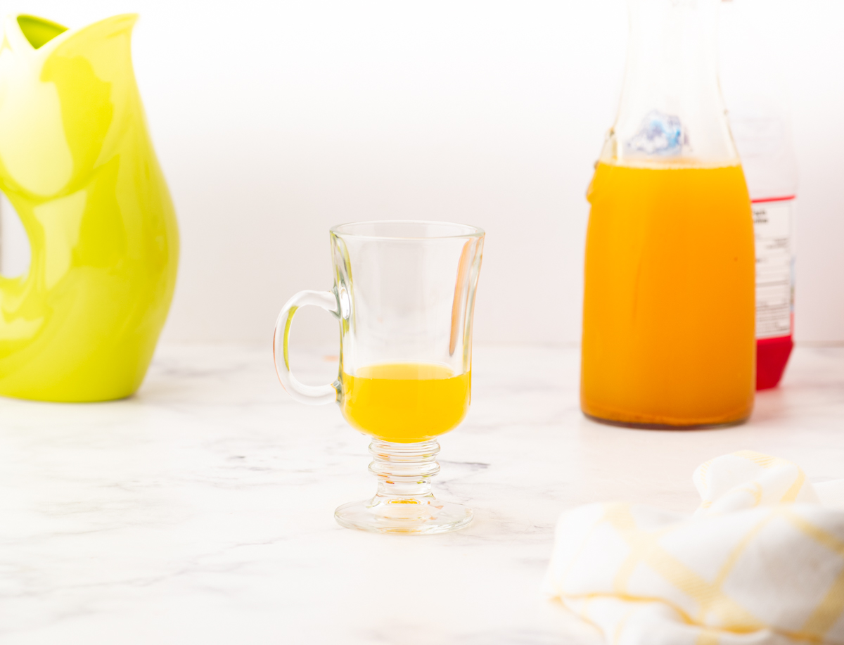 tumeric tea concentrate in a cup