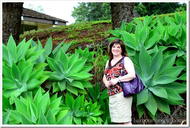 rita in front of big plants