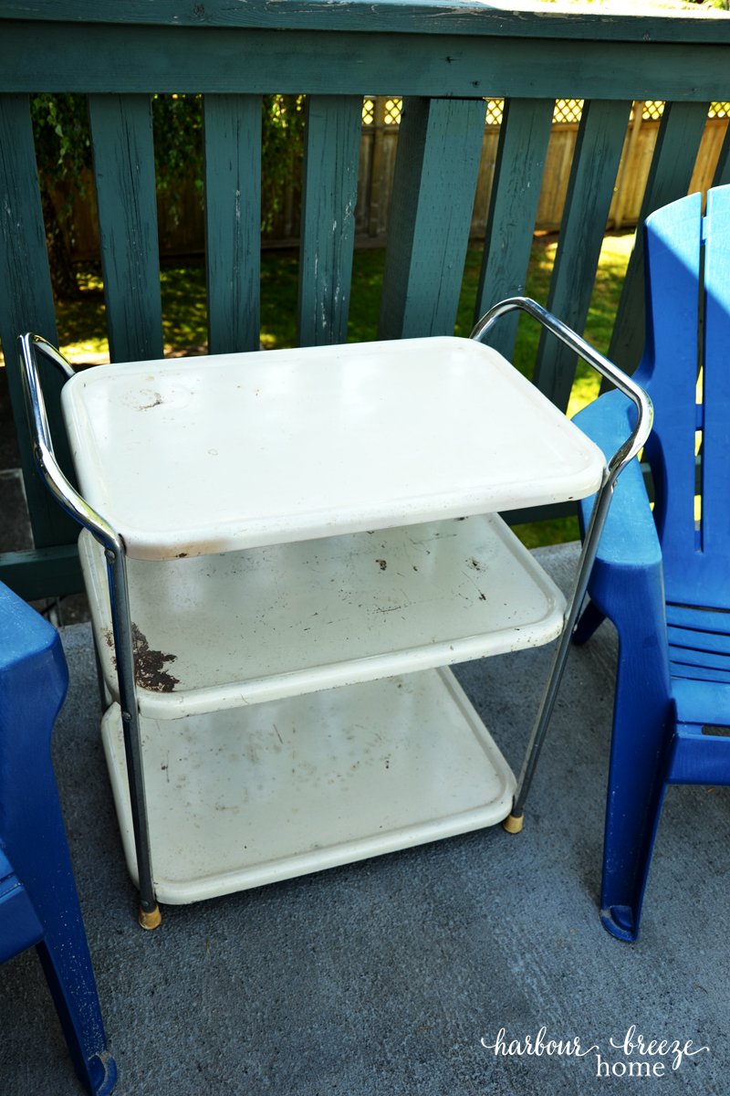 Rusty 3 tier rolling cart before its makeover ~ a vintage metal cart that is rusty and worn