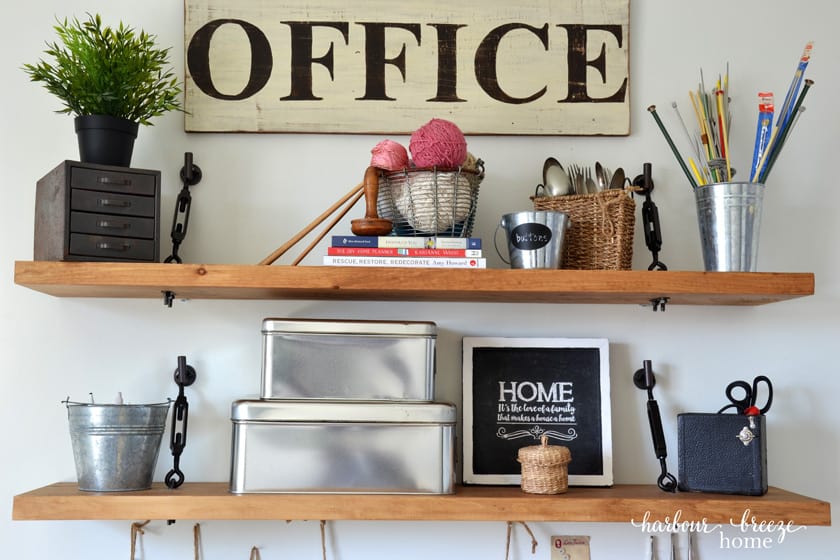 floating shelves above a dresser with turnbuckle hardware