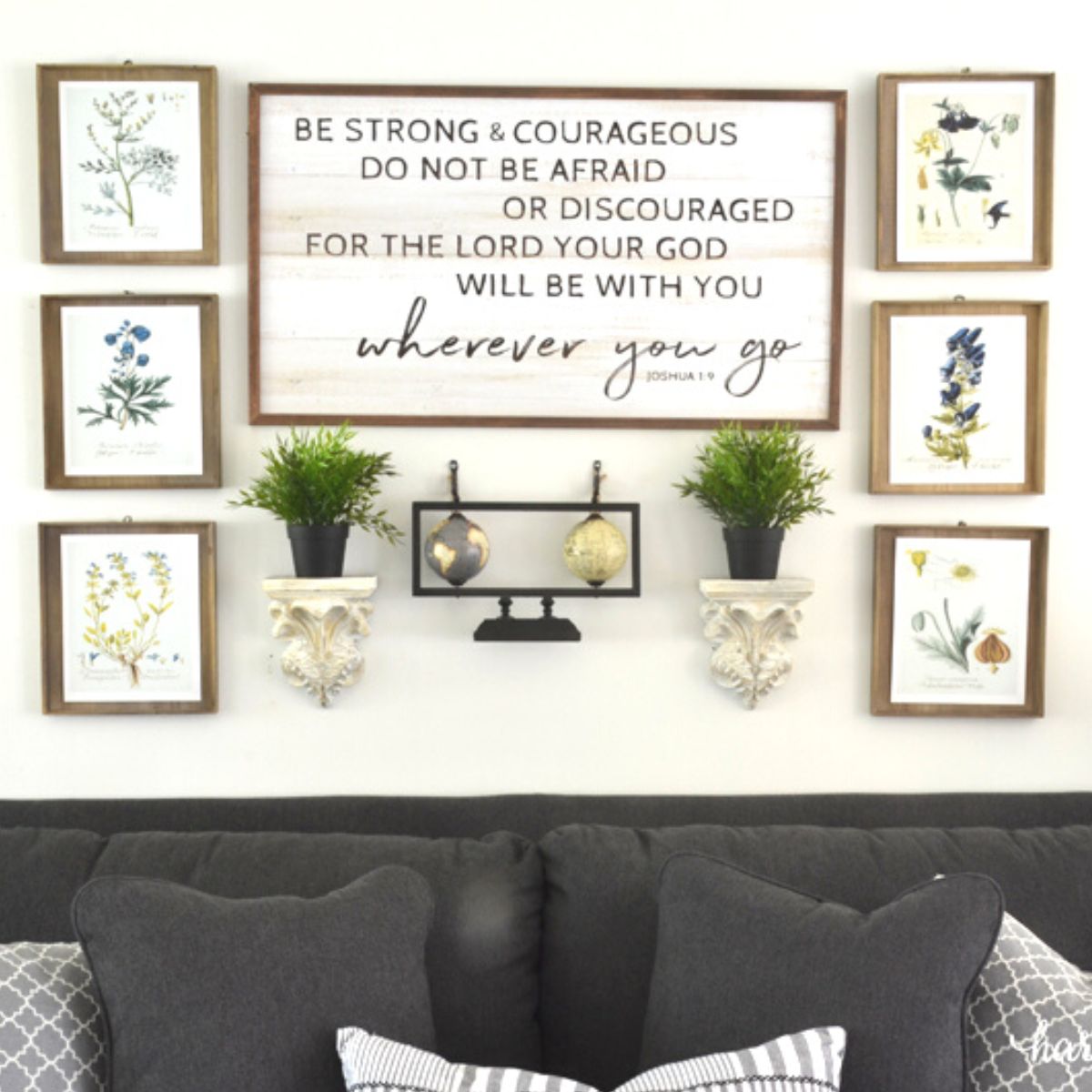 gallery wall of picture above a couch