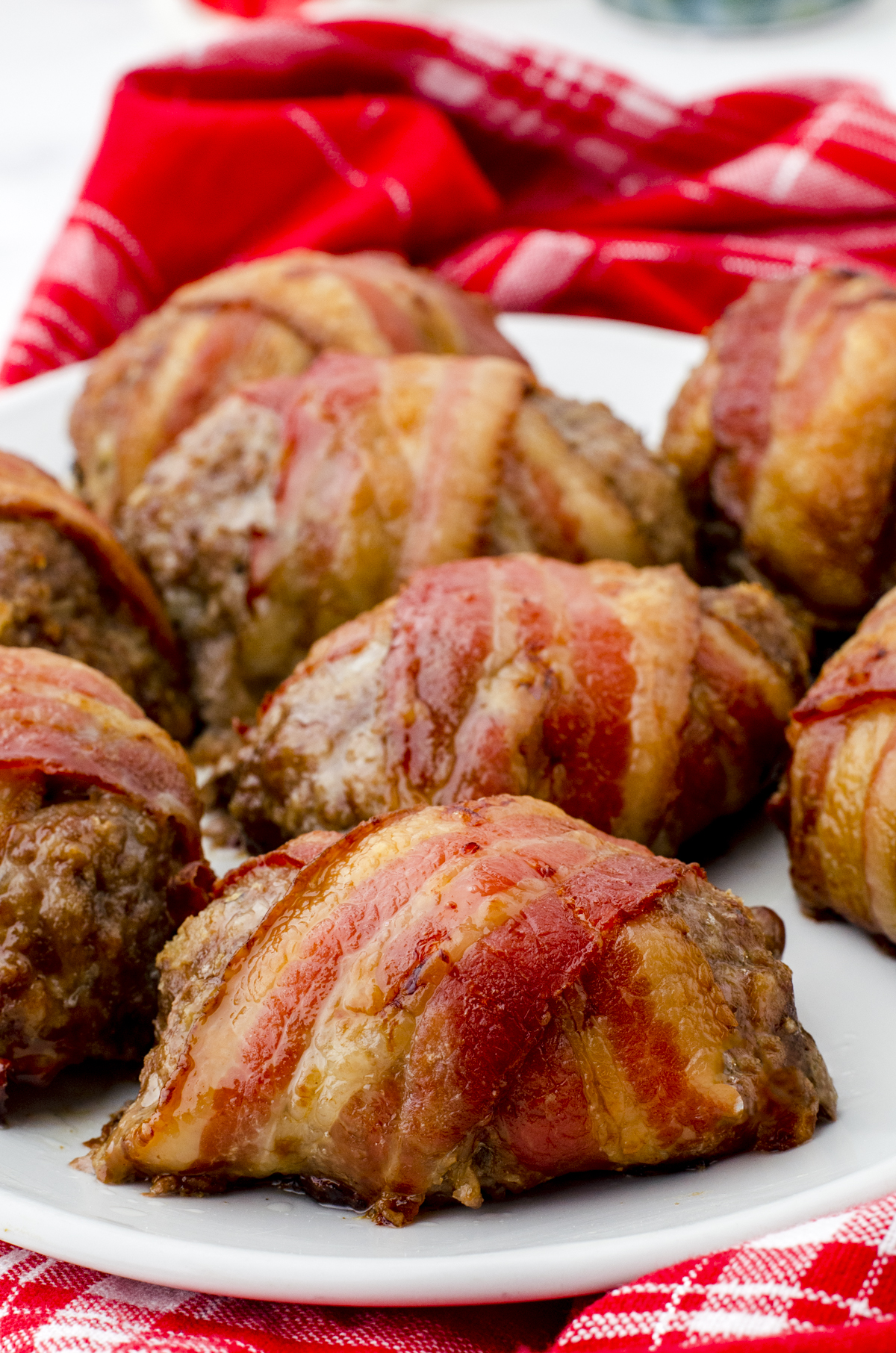 Individual mini meatloaf wrapped in bacon