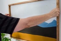 Hang a Picture on Drywall with Two Hooks: Step-by-Step Guide