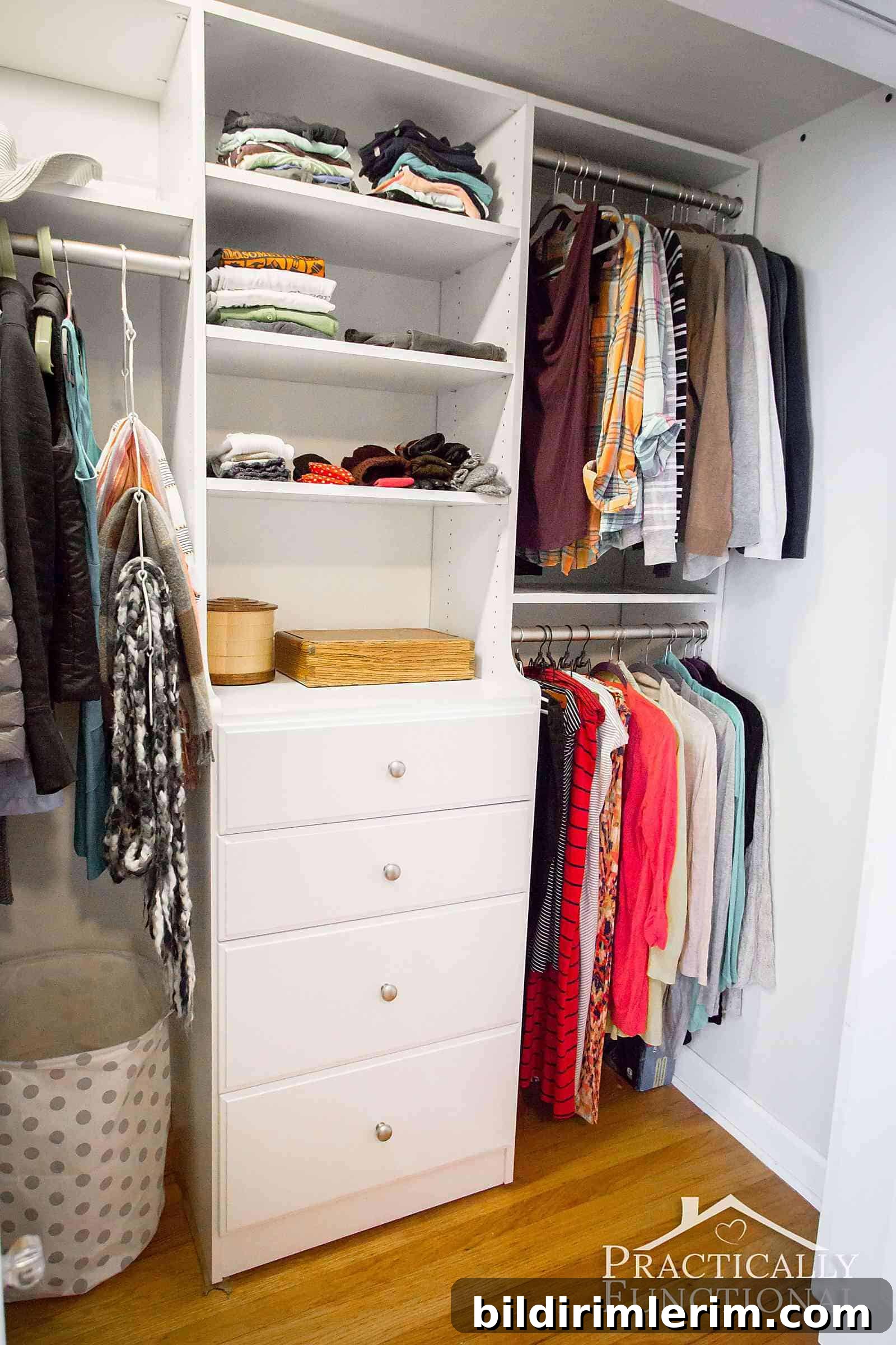 Organized small closet with central dresser and hanging sections