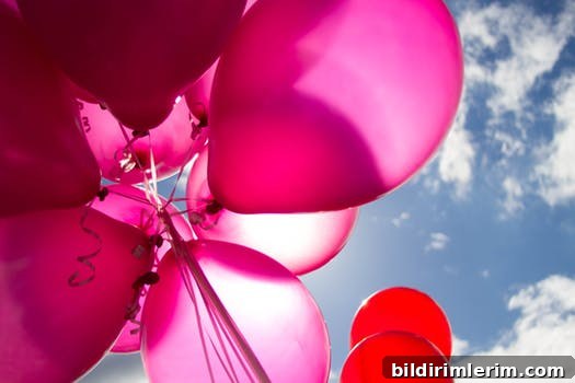 Pink balloon and fireworks