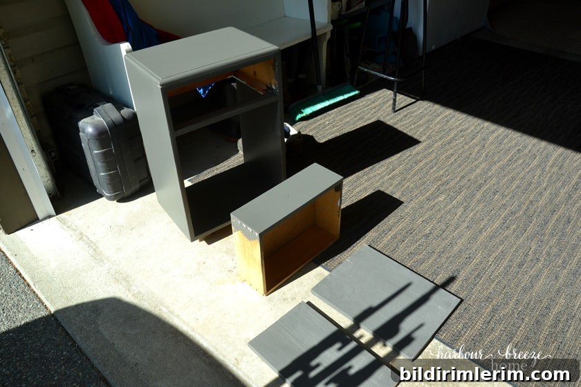Interior shelves added to end table for laptop storage