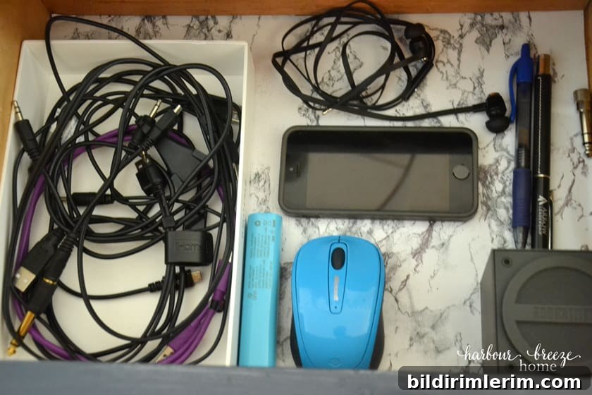 Top drawer used for cords and tech accessories