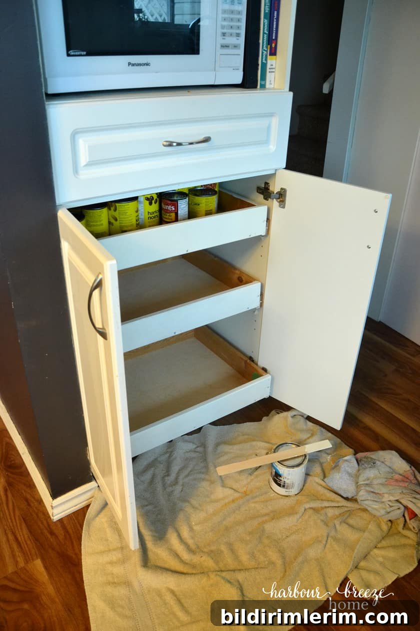shelves of a pantry cupboard that are ready to be painted