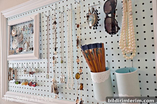 a pegboard is transformed into a jewelry and accessories organizer with strategically placed hooks for necklaces, earrings, and sunglasses