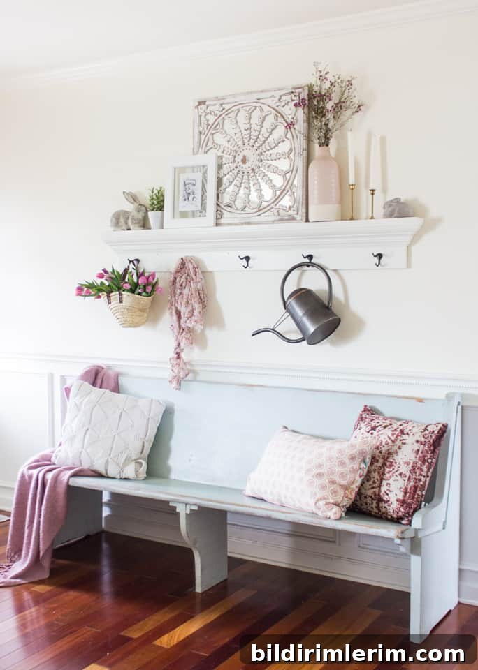 Modern Farmhouse Bloggers to Follow for Home Design 8 light blue painted church pew with a shelf with hooks above it
