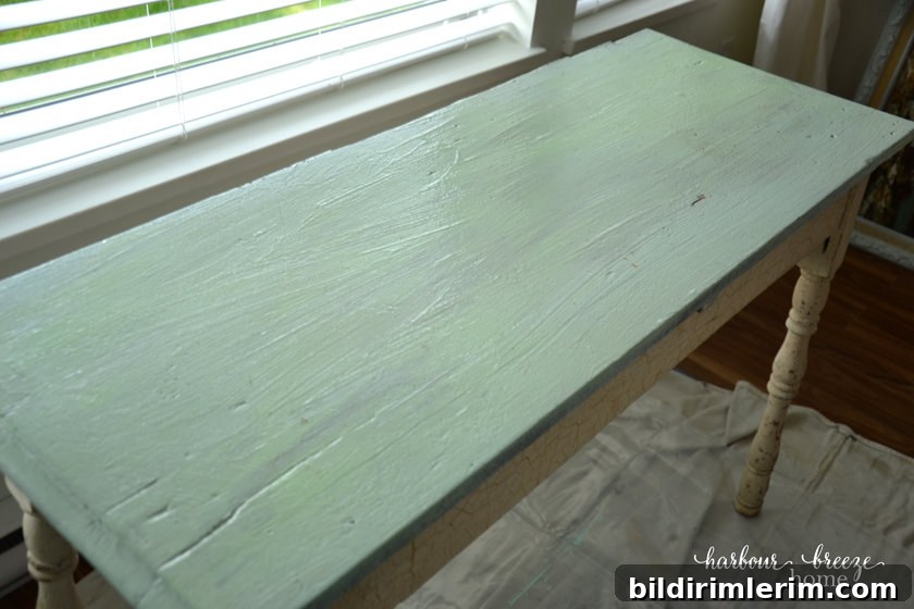 table top with thick, clear liquid spread on the top