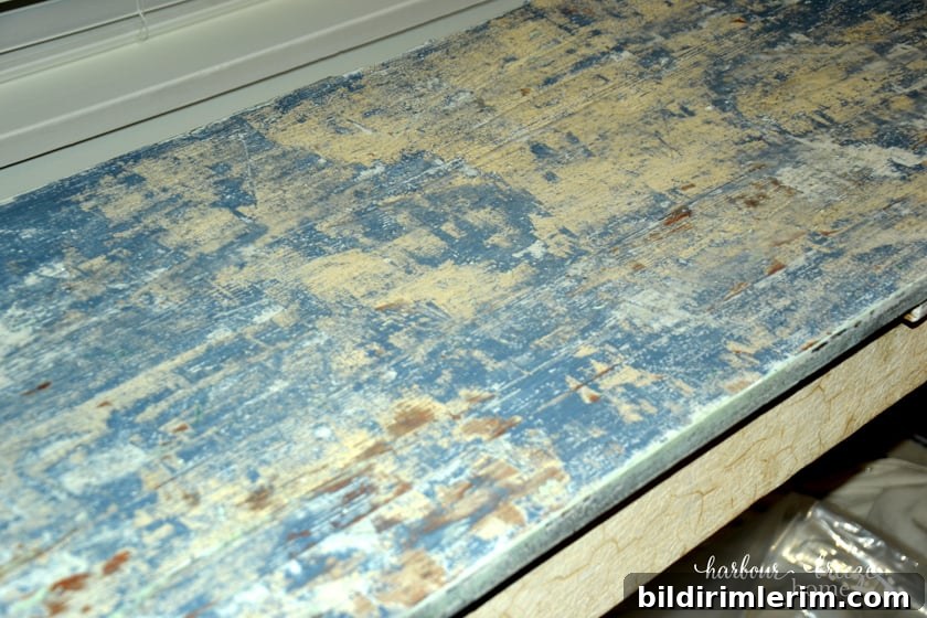 Picture of a table top with layers of paint