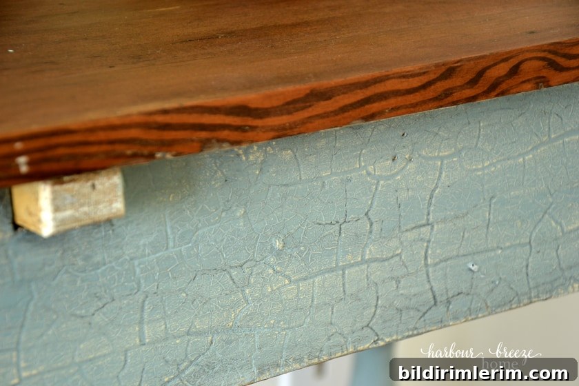 close up of desk with country chic elegance paint color and dark stained wood top