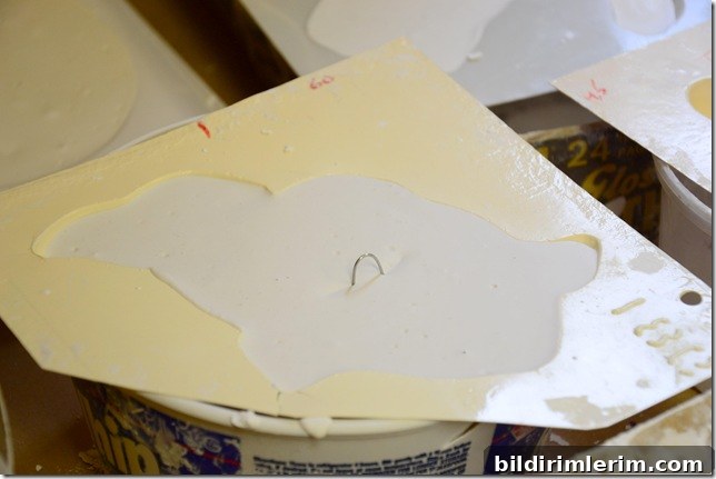 hardened plaster of paris in a mould ready to be removed