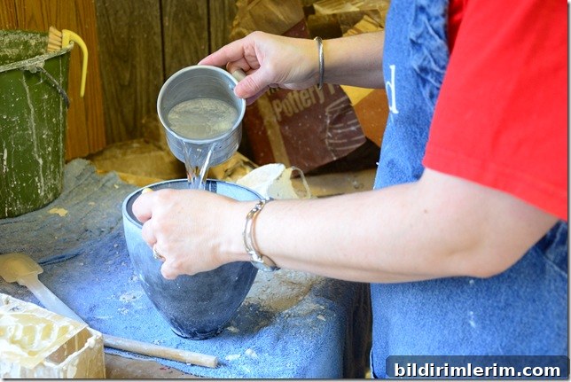 water being added to a rubber plaster mixing bowl