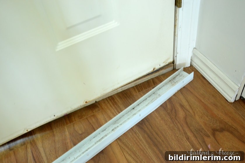 How to paint vinyl door sweeps a custom color a vinyl door sweep removed from the bottom of a door