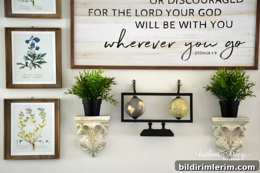 close up of a portion of the gallery wall arrangment above a couch