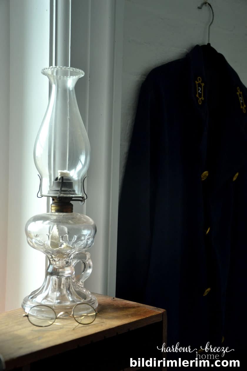 oil lantern by a window