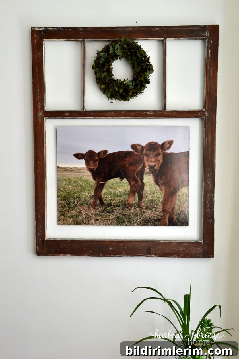 Large photo mounted on foam board hung on the wall.