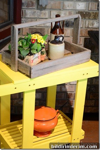 yellow cart beside barbecue
