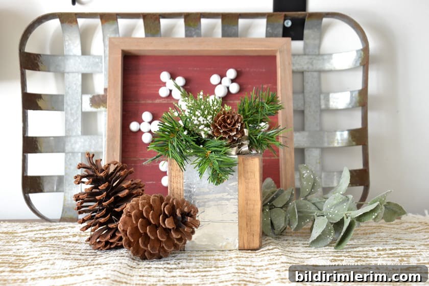 wood block gift farmhouse decor sitting in front of a metal tray on a table