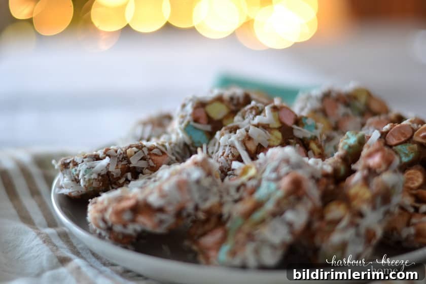 Church window cookies on a plate with colored marshmallows and coconut.