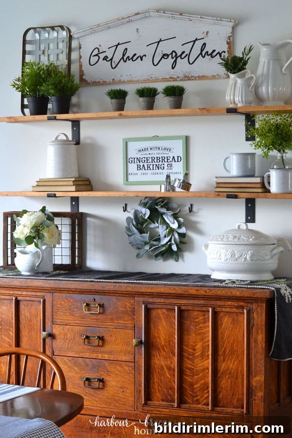 Winter Shelf Decorating Ideas: Proven Styling Tips 9 DIY Fixer Upper wall shelves decorated with farmhouse decor for Winter above a Dining Room buffet.