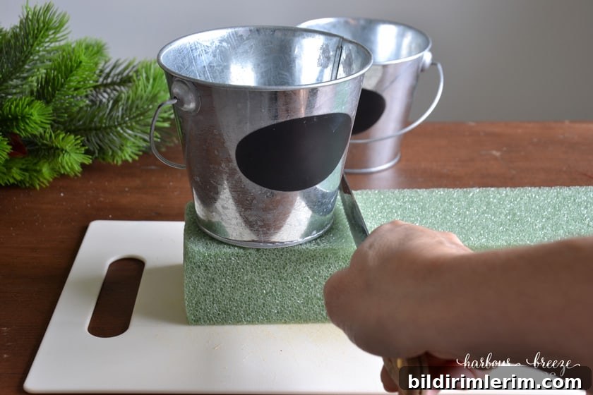 DIY Mini Flocked Christmas Tree Tutorial 4 cutting floral foam the size of a small bucket as a base for a little christmas tree