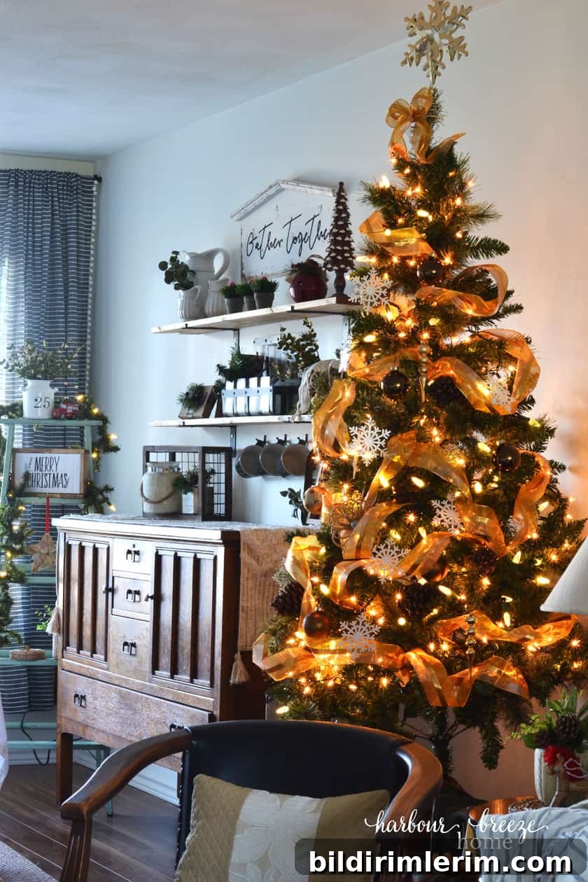 Dining room with farmhouse Christmas tree and twinkle lights